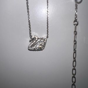 Swarovski crystal swan necklace missing a couple of crystals